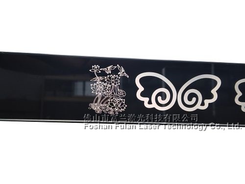 Spray coated glass laser laser engraving light pattern characters